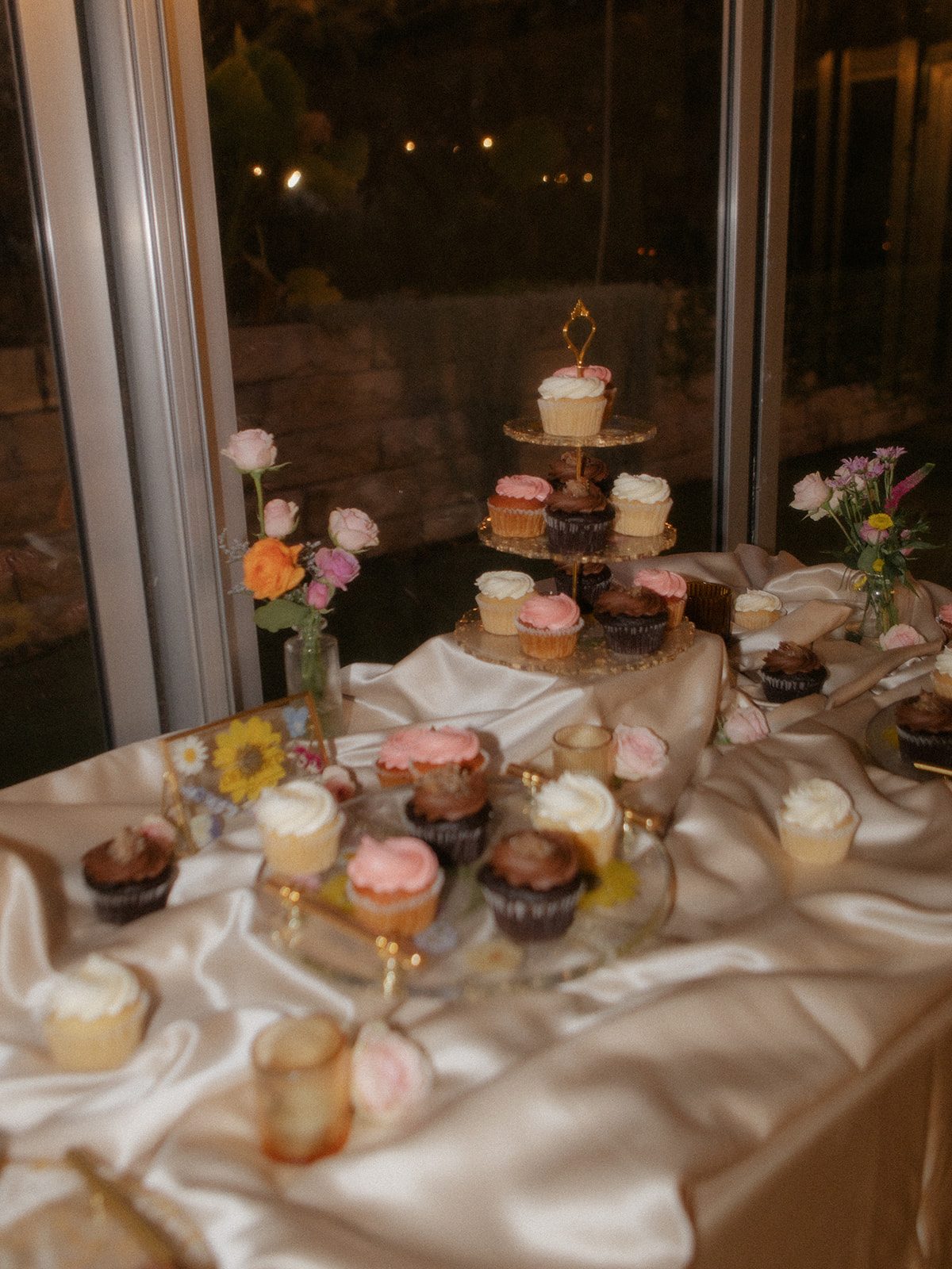 Candy and dessert station styled with fresh flowers