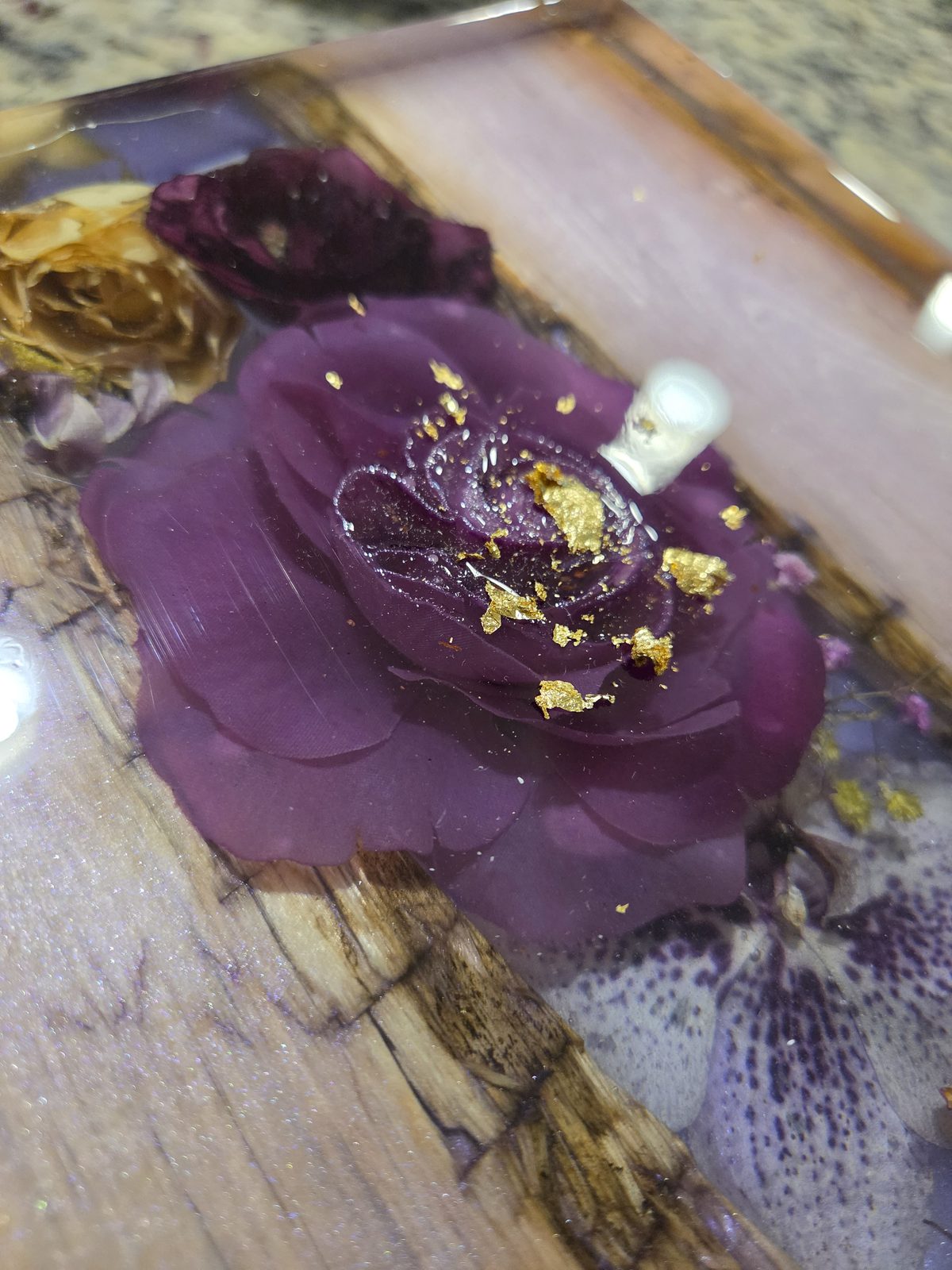 Custom resin coaster with preserved rose and gold leaf