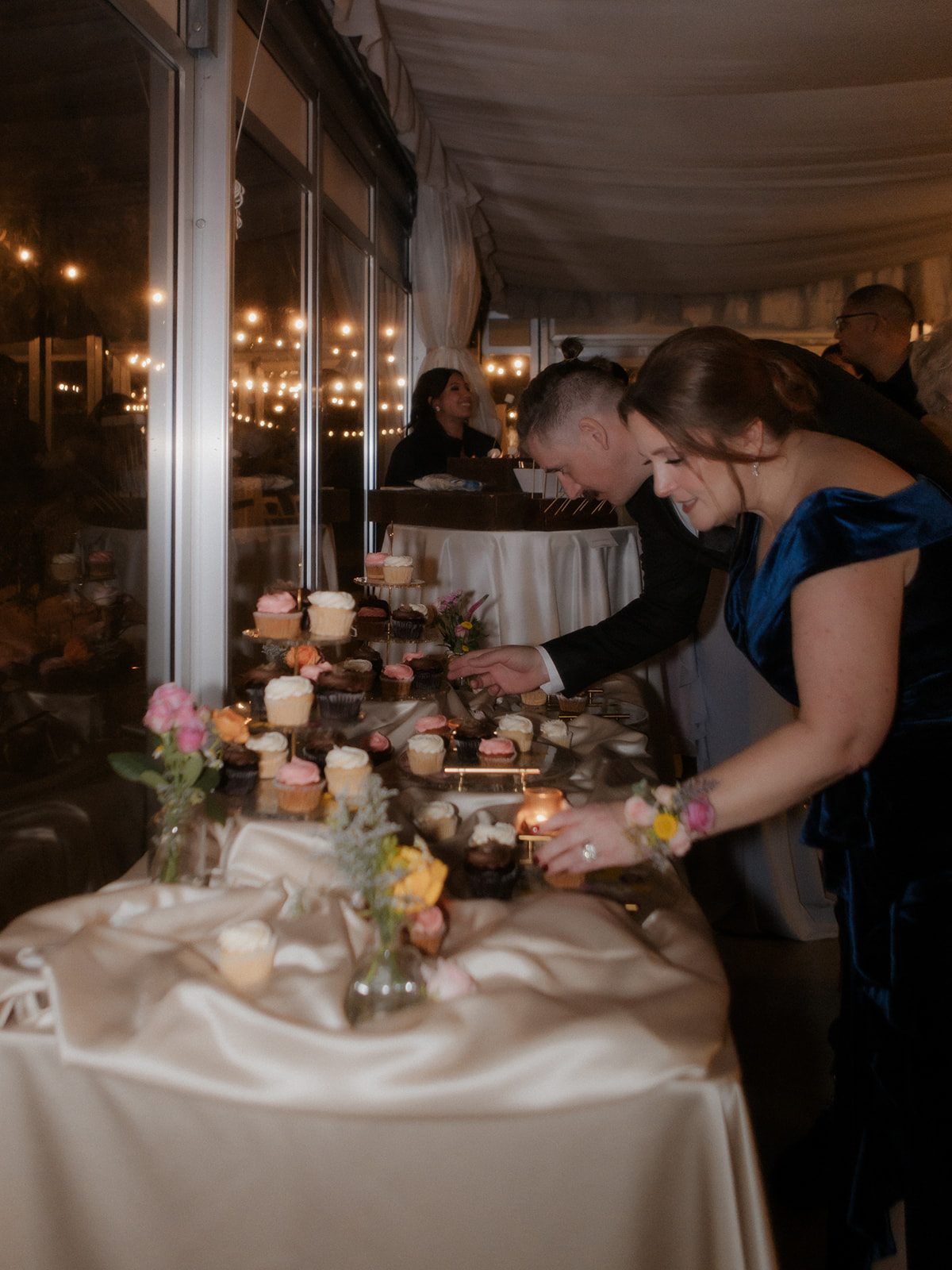 Guests enjoying the candy and dessert display
